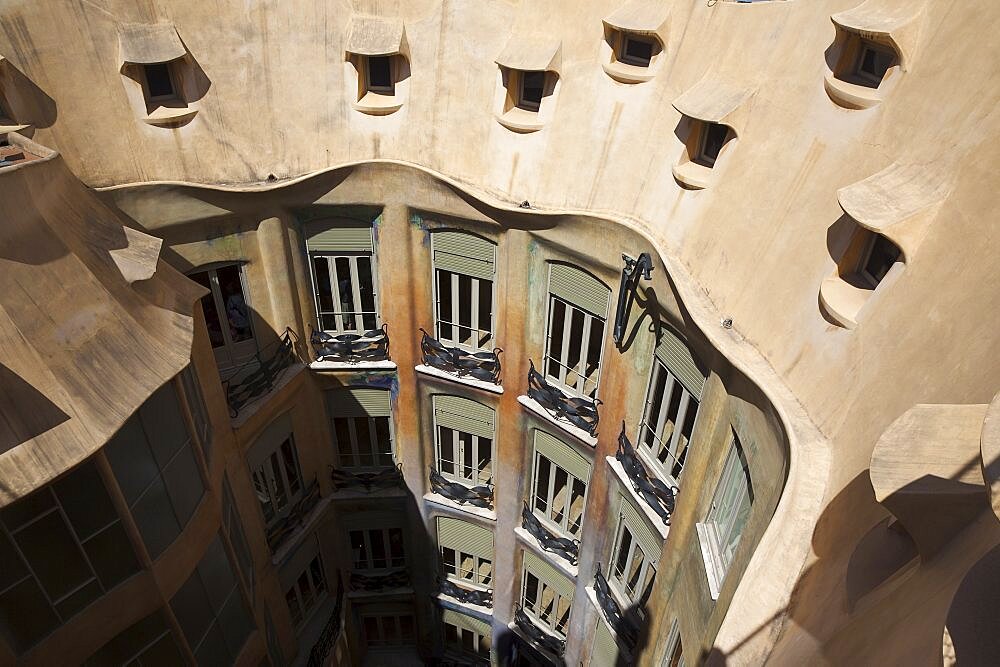 Spain, Catalonia, Barcelona, a Pedrera or Casa Mila on Passeig de Gracia, deisgned by Antoni Gaudi.