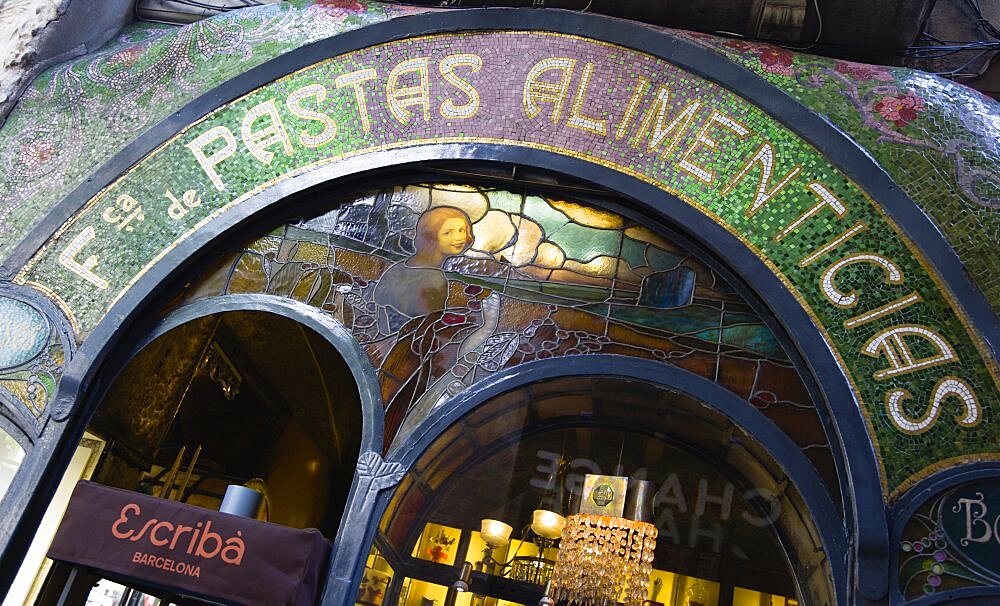 Spain, Catalonia, Barcelona, Art Nouveau tiled facade of the Escriba pastry shop on La Rambla in the Old Town district.