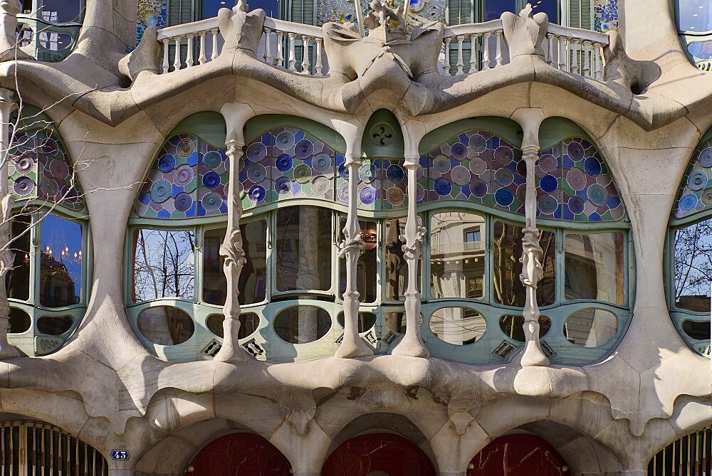 Spain, Catalunya, Barcelona, Casa Batllo by Antoni Gaudi, detail of window exterior.