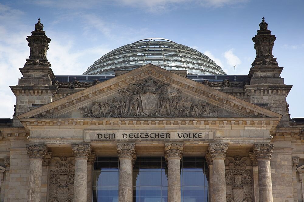 Germany, Berlin, Mitte, Reichstag building with glass dome deisgned by Norman Foster.