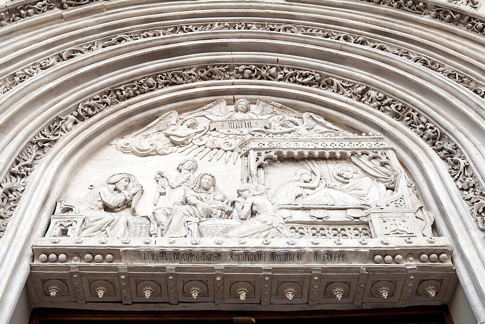 Spain, Madrid, Detail of Nativity scene from the main portal of church San Jeronimo el Real.