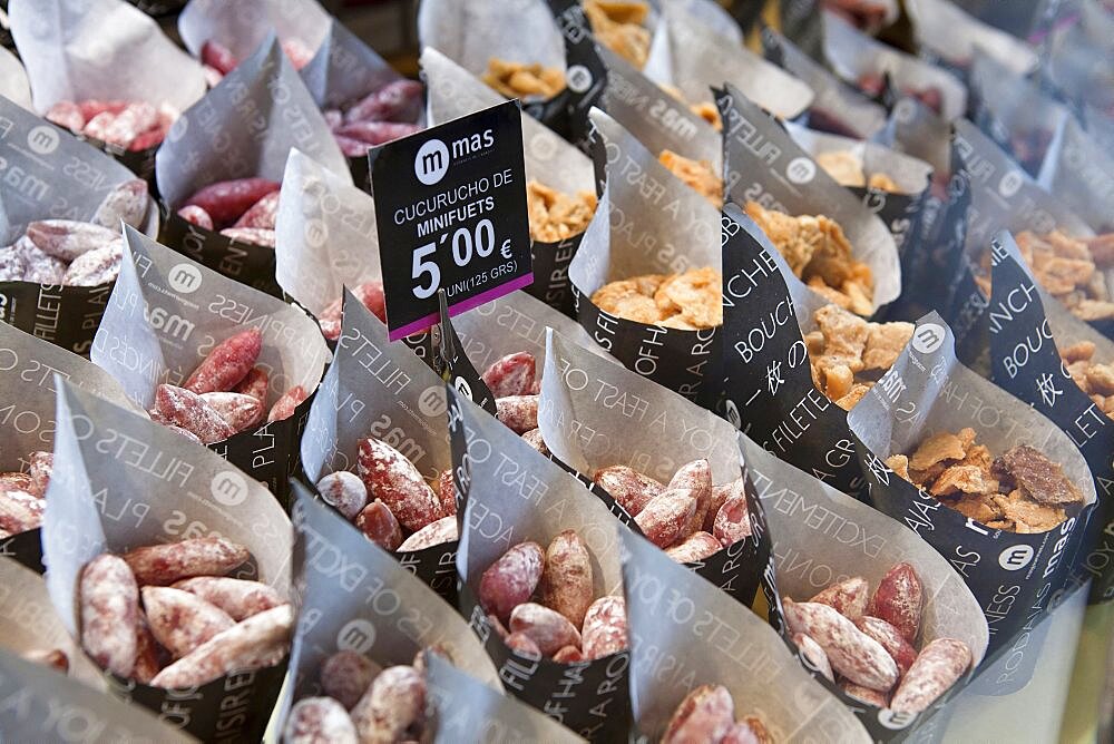 Spain, Madrid, Tapas on sale at Mercado de San Miguel.