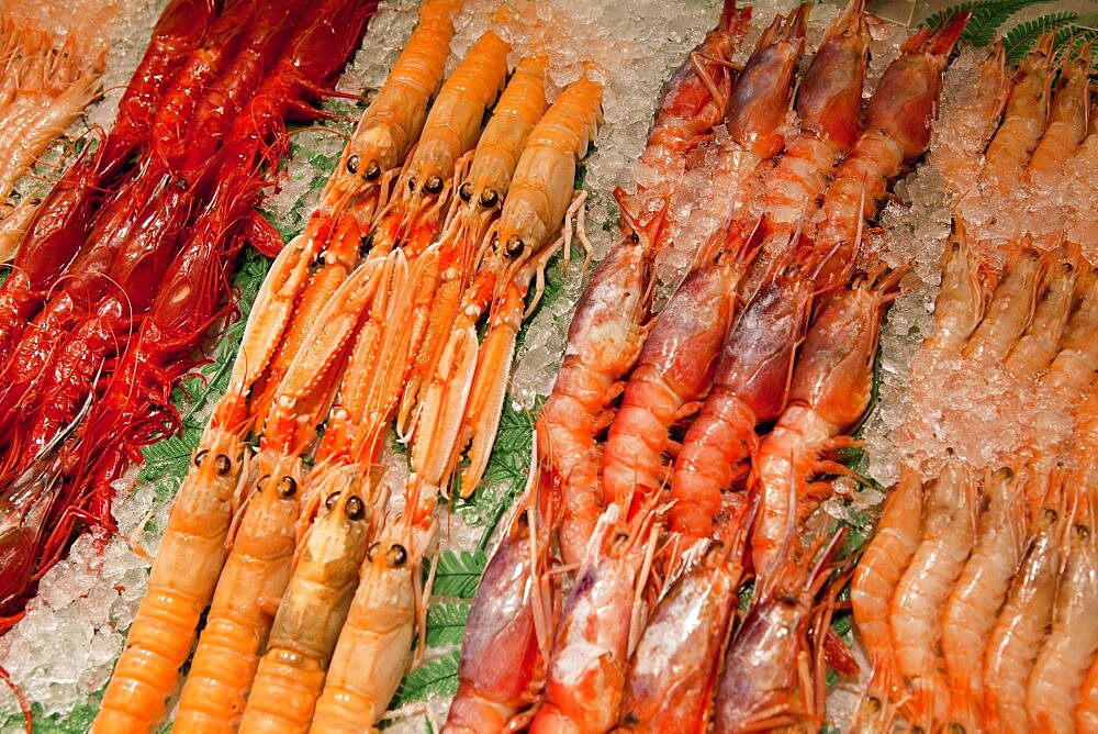 Spain, Madrid, Display of langoustines on a stall in the Mercado San Anton.