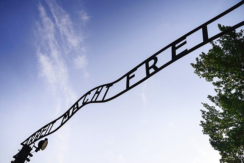 Poland, Auschwitz-Birkenau State Museum, Auschwicz Concentration Camp, 'Arbeit Macht Frei' slogan above the entrance gate.