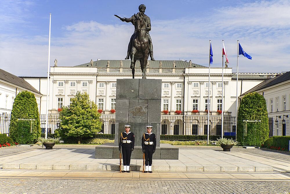 Poland, Warsaw, Poland, Warsaw, Ul Krakowskie Przedmiescie or The Royal Way, Radziwill Palace, Presidential Residence with a statue of Prince JÃƒÂ³zef Poniatowski and 2 guards in front.