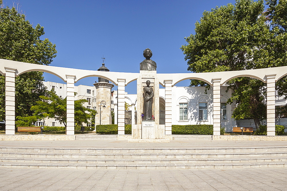 Romania, Constanta, Statue of Mihai Eminescu, and the Genoese lighthouse.