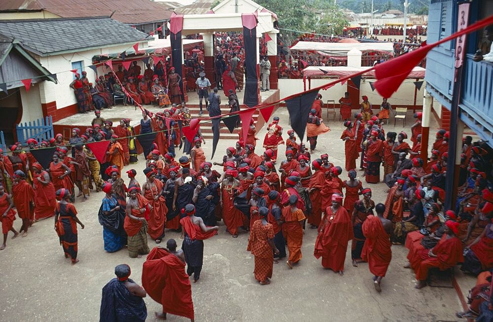 GHANA People Ashanti View looking down on group of Ashanti people gathered at a funeral dressed in red the colour of mourning  Color