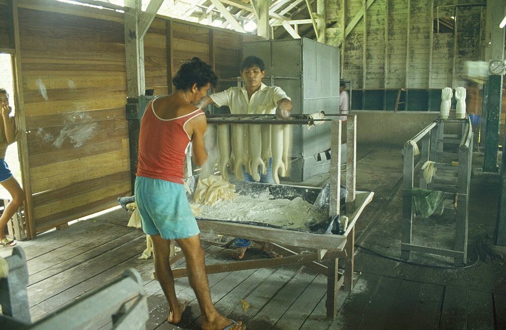 BRAZIL Near Santar?m Betterra Local rubber factory with men making rubber gloves