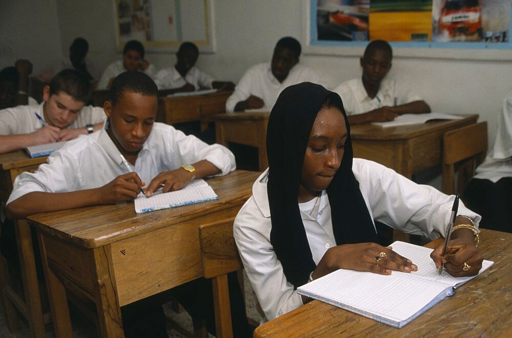 NIGERIA  Kano Students sitting at desks in a Primary school African Kids Learning Lessons Nigerian Teaching Western Africa