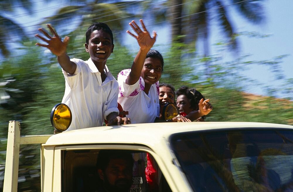 SRI LANKA People Children Children waving from the back of a truck driven by man. Asia Asian Kids Llankai Lorry Sri Lankan Van   Asia Asian Kids Llankai Lorry Sri Lankan Van