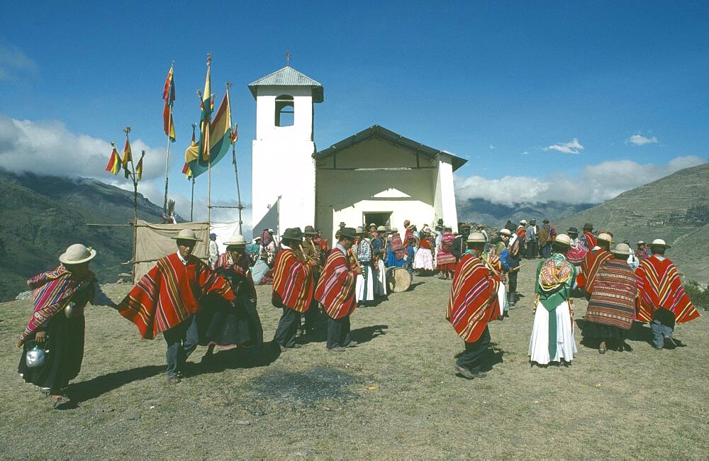 BOLIVIA La Paz Amarete Nino Corrine.  Fiesta de la Cruz.  Countrywide festival held on May 3rd.  Musicians and dancers outside hilltop church.