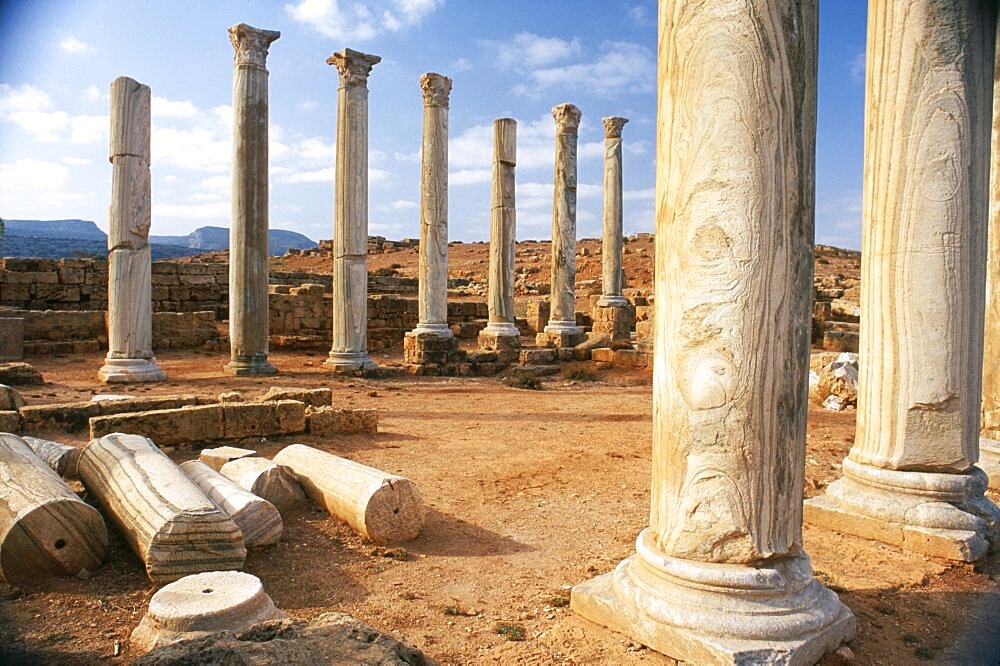 LIBYA Cyrenaica Apollonia Ancient harbour of Cyrene and a city in its own right.  Colonnade and fallen masonry.