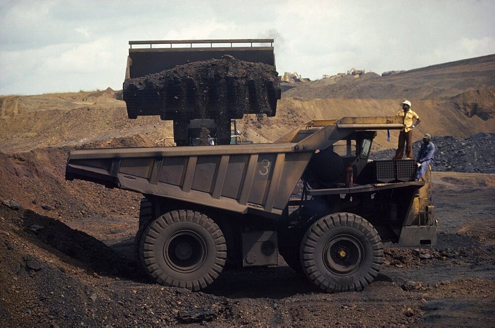 GABON  Moanda Loading large truck at manganese mine.  Lorry