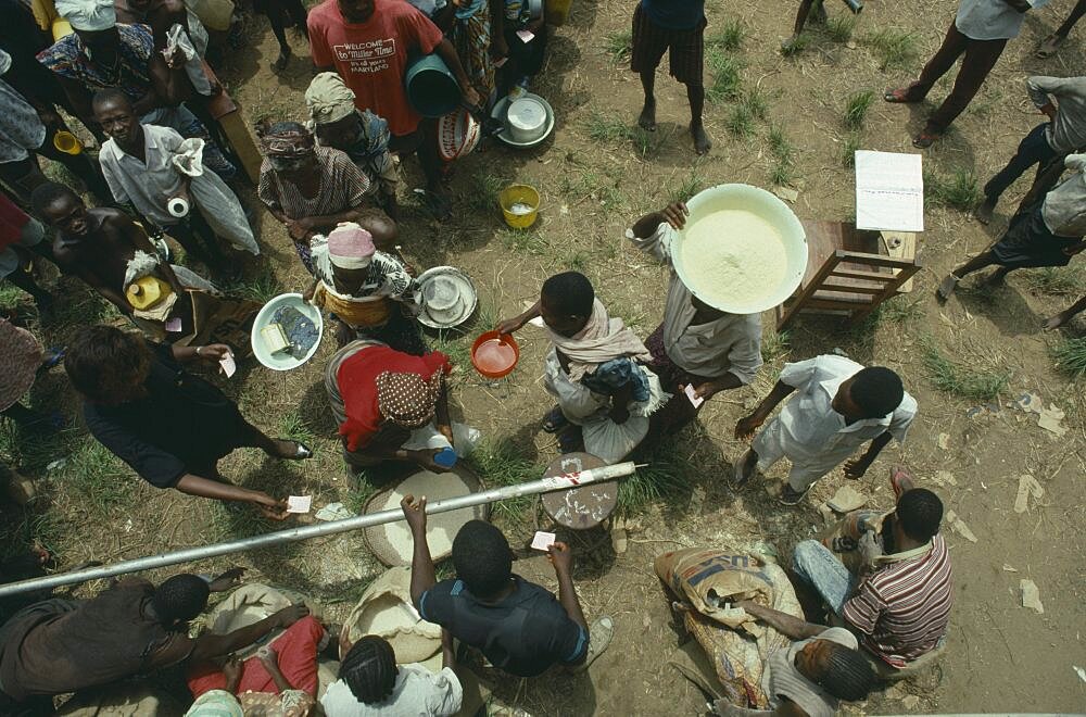 LIBERIA  War People displaced by civil war queue for UN food aid. United Nations World Food Programme