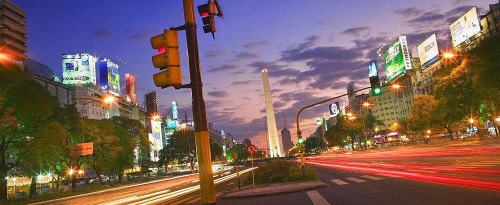 ARGENTINA  Buenos Aires View along Avenida 9 de Julio towards the Obelisco at dusk.  South America Latin America Travel Buenos Aires Av 9 de Julio panorama skyline Argentina icon American Argentinian Hispanic Latino