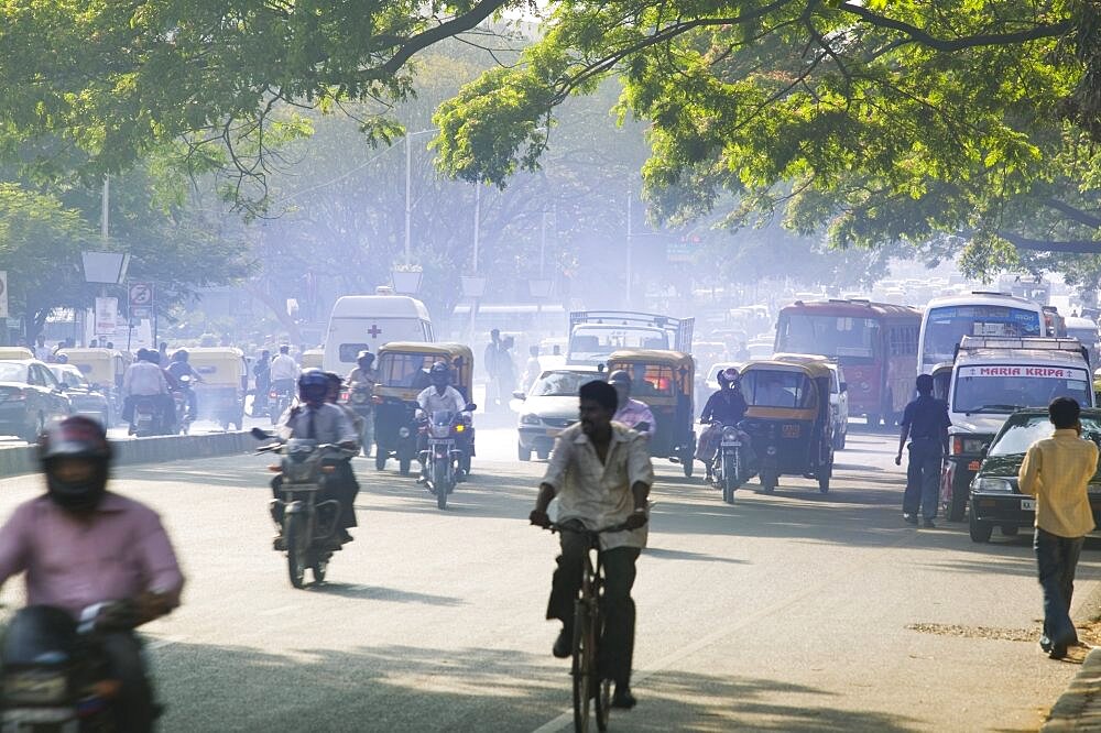 INDIA Karnataka Bangalore Heavy traffic on Mahatma Gandhi  MG  Road. India Busy Bangalore Travel Asia Sub-Continent Karnataka Urban Pollution Mahatma Gandhi Traffic Exhaust Fumes Chaos Street Crowded Asian Bharat Inde Indian Intiya Ecology Entorno Environmental Environnement Gray Green Issues Grey