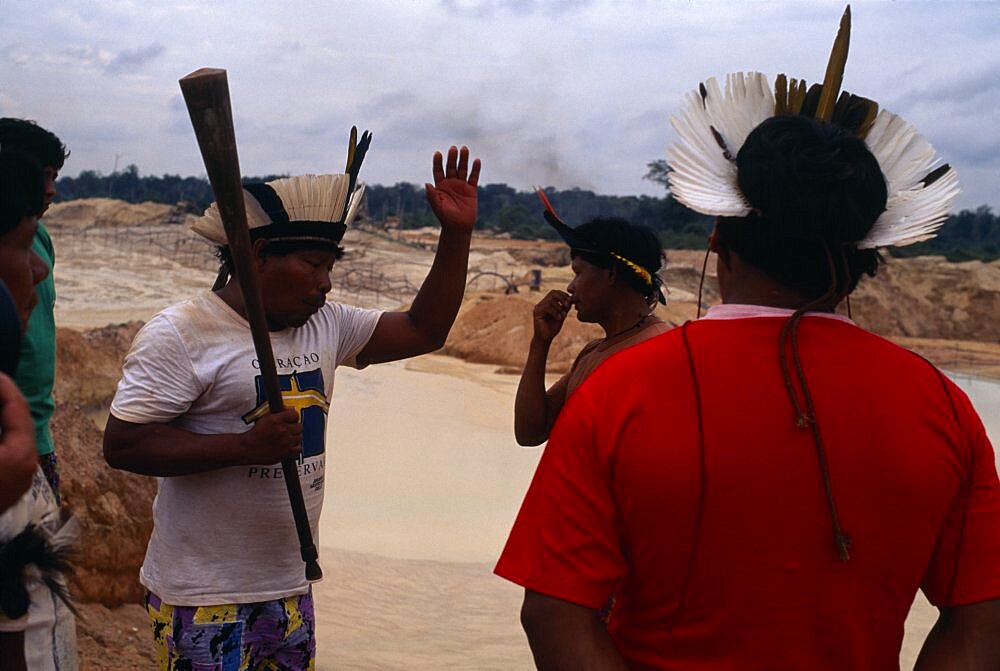 BRAZIL Mato Grosso Peixoto de Azevedo Garimpo  goldmine on former Panara territory.  Headman Aka declaims against actions of garimpeiros resulting in the environmental                     ruin of Panara homelands. Garimpeiro small scale prospector informal displaced people formally known as Kreen-Akrore  Krenhakarore  Krenakore  Krenakarore  Amazon displaced people American Brasil Brazilian Ecology Entorno Environmental Environment Green Issues Kreen Akore Latin America Latino Scenic South America