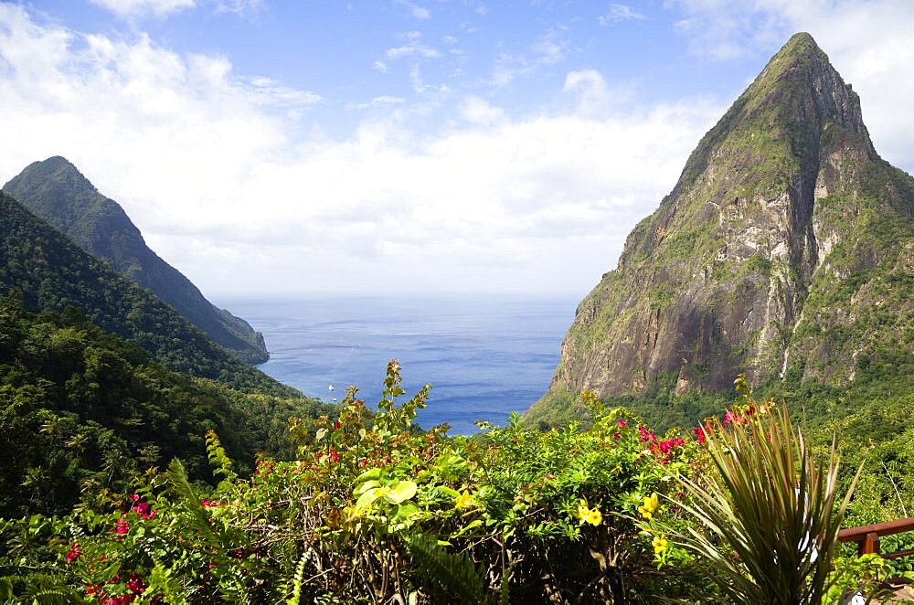 Val des Pitons The volcanic plugs of Gros Piton on the left and Petit Piton on the right with the lush valley seen from the sun deck of the Ladera Spa Resort Hotel, Soufriere, St Lucia