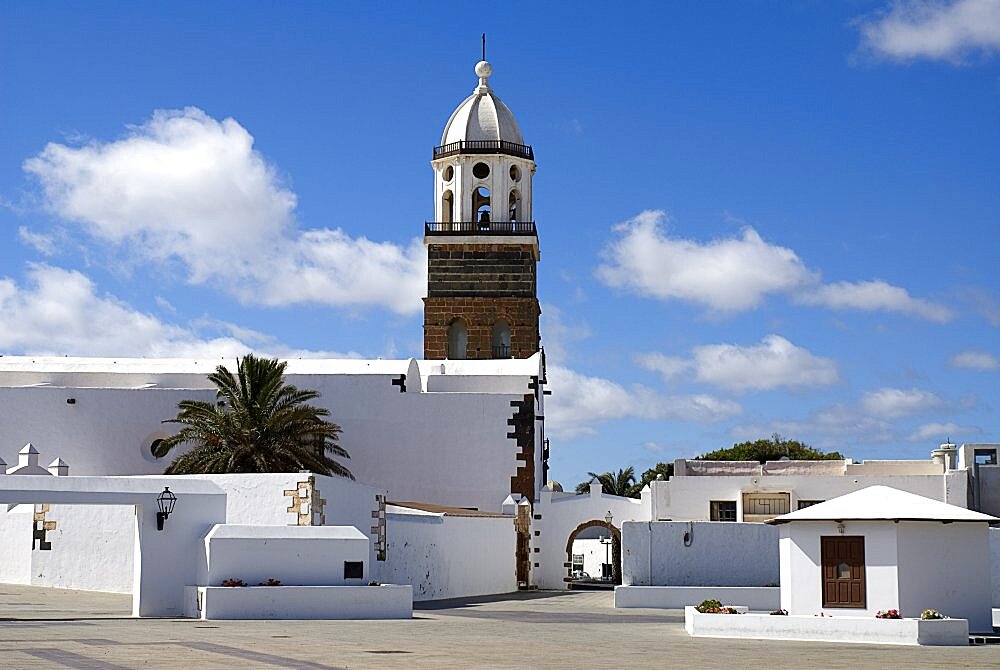 Teguise the former capital of the island, Church of Nuestra Senora de Guadalupe also known as Iglesia de San Miguel white painted exterior and bell tower, Lanzarote, Canary Islands, Spain