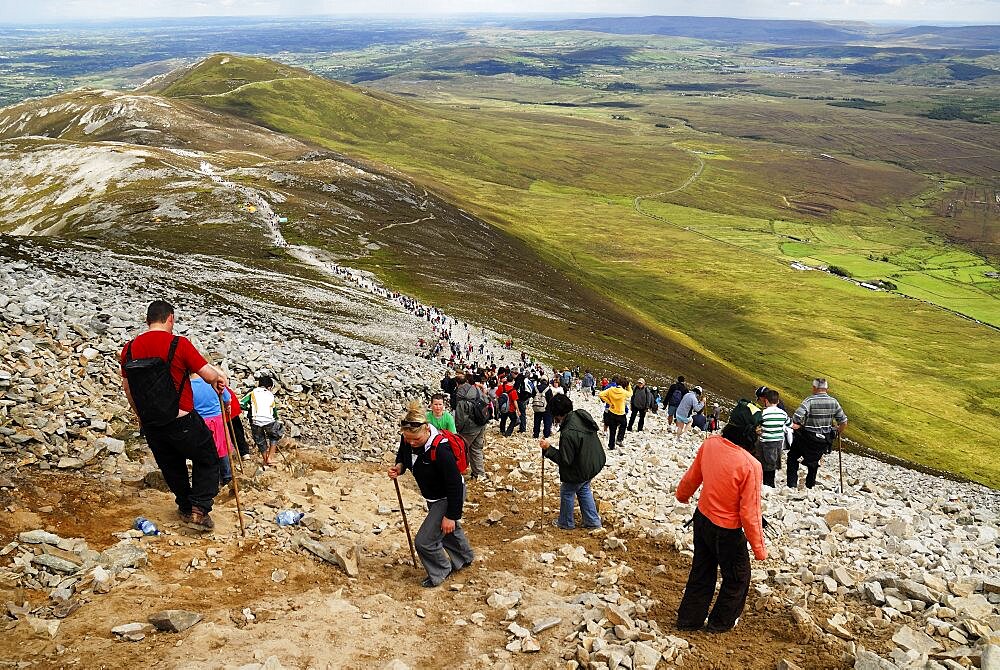 Pilgrims making their way to the top of the mountain as part of the pilgrimage, Croagh Patrick, County Mayo, Republic of Ireland