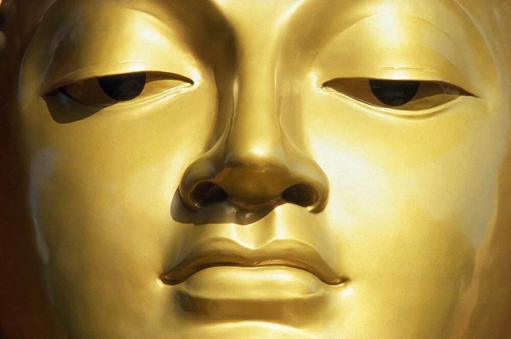 SRI LANKA  Colombo Close up of a Golden Buddha s face