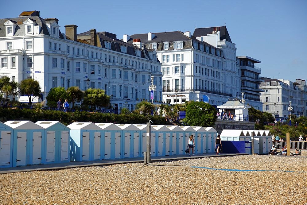 Beach huts below the seafront promenade and Hotels, United Kingdom