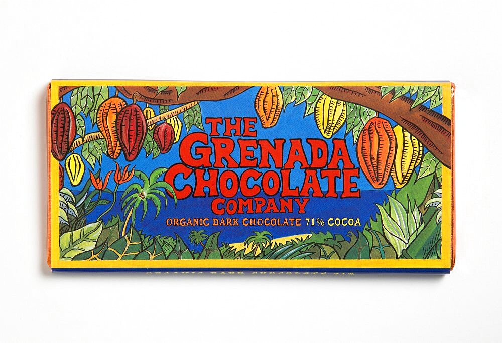 Bar of 71% percent cocoa organic dark chocolate form The Grenada Chocolate Company in colourful wrapper, Grenada, Caribbean