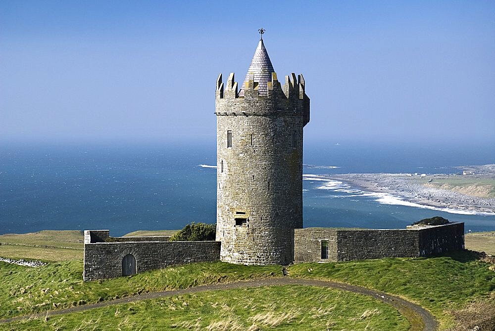 Ireland, County Clare, Doolin, Doonagore Castle is a round 16th century tower house 1 km above Doolin village