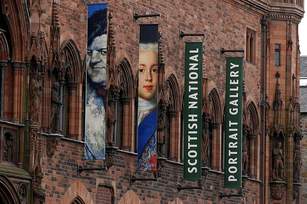 Scotland, Lothian, Edinburgh, Exterior of the Scottish National Portrait Gallery in Queen Street with banners attached to the building.