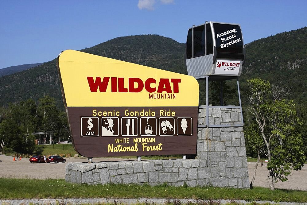 New Hampshire, USA, Wildcat Mountain ski area, Sign advertising scenic gondola cable car rides.