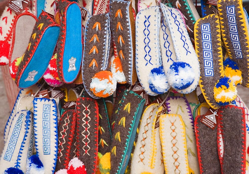 Greece, Attica, Athens, Traditional footwear on sale in the Plaka district, lying just beneath the Acropolis