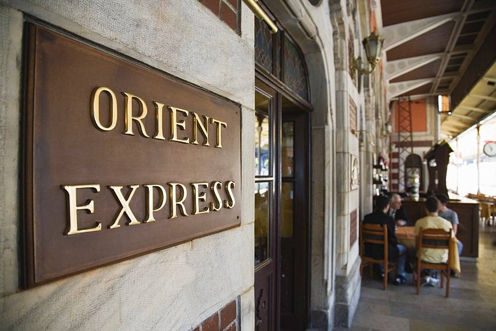 Turkey, Istanbul, Sultanahmet, Orient Express sign beside cafe on station platform Istanbul Sirkeci Terminal or Sirkeci is a terminus main station of the Turkish State Railways or TCDD in Sirkeci, on the European part of Istanbul International, domestic and regional trains running westwards depart from this station which was inaugurated as the terminus of the Orient Express