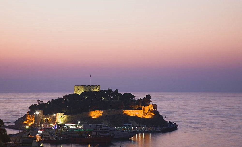 Turkey, Aydin Province, Kusadasi, Sunset over Guvercin Ada, the peninsula of Kusadasi, also known as Pigeon Island