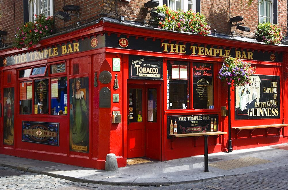 Ireland, County Dublin, Dublin City, Temple Bar traditional Irish public house on street corner with cobbled street.