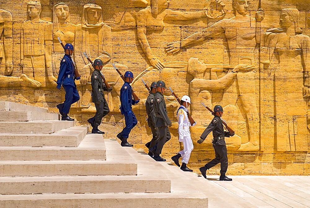 Turkey, Ankara, Anitkabir, Mausoleum of Mustafa Kemal Ataturk founder of the modern Turkish Republic and president in 1923. Changing of the Guard taking place in foreground of relief carved frieze.