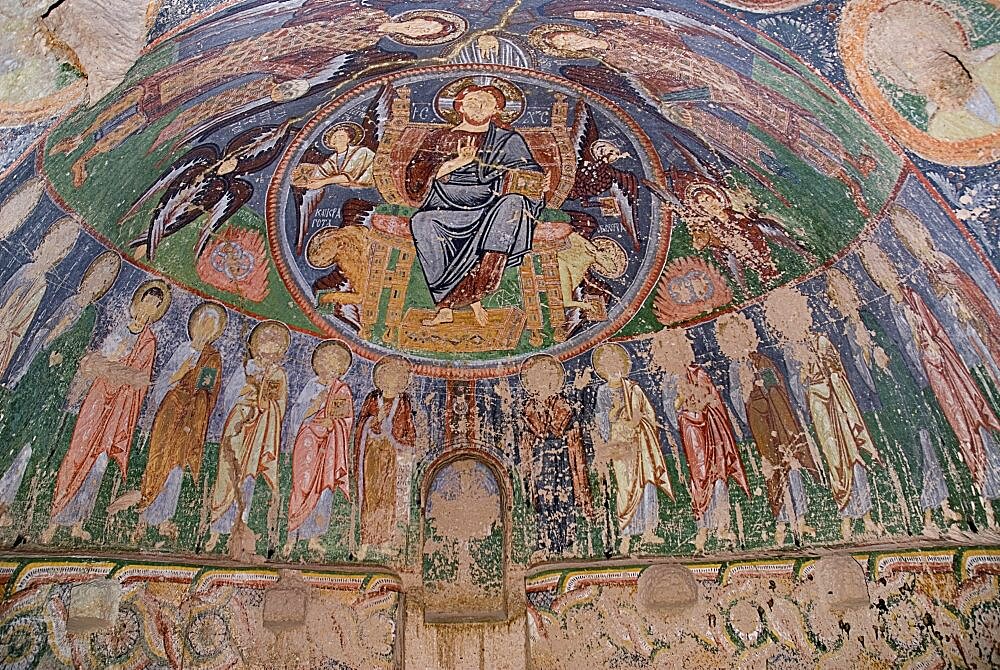 Turkey, Cappadocia, Goreme, Red Valley. Hacli Kilise or The Church of the Cross. Interior of rock cut cave church on the North rim of the Red Valley with detail of ceiling fresco damaged by superstitous gouging to eradicate the evil eye.