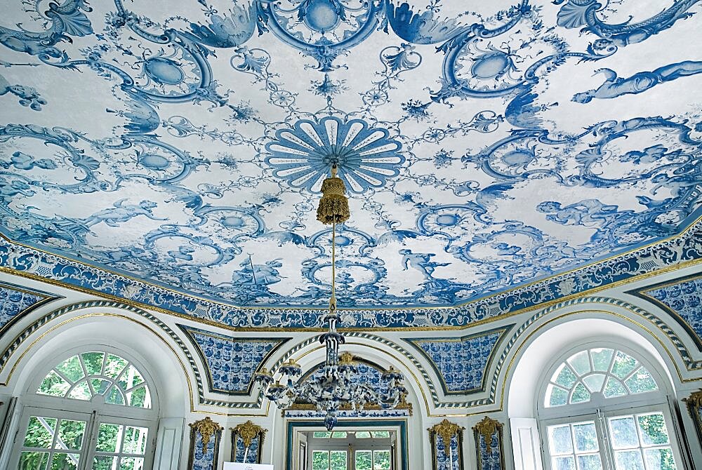 Germany, Bavaria, Munich, Nymphenburg Palace the Pagodenburg. Interior of elegant pavilion for royal relaxation with over 2000 blue and white painted Dutch tiles decorating the walls and ceiling.