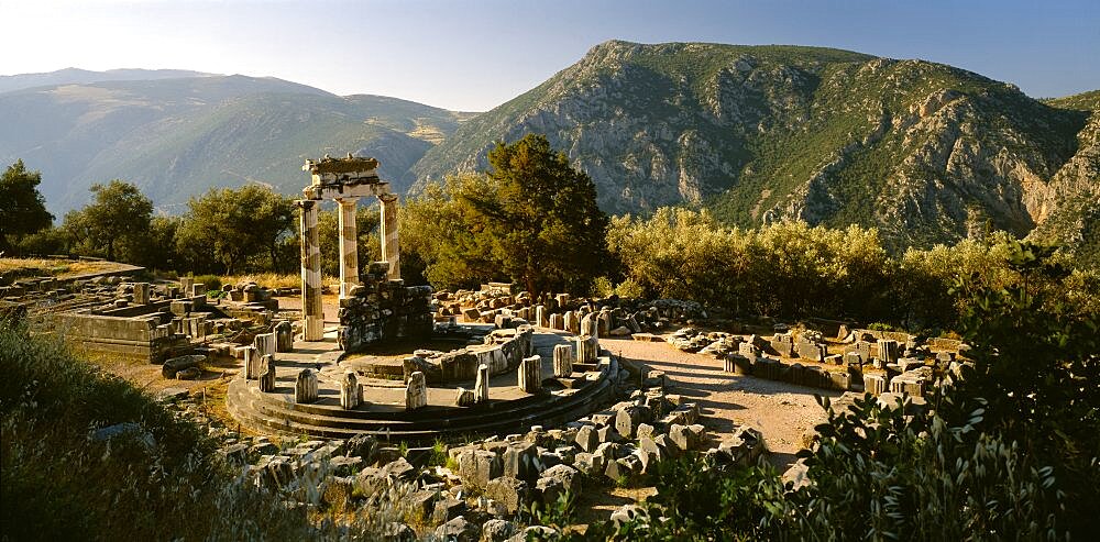 GREECE Central Greece Delphi Sanctuary of Athena.  View over ruins in mountain landscape.