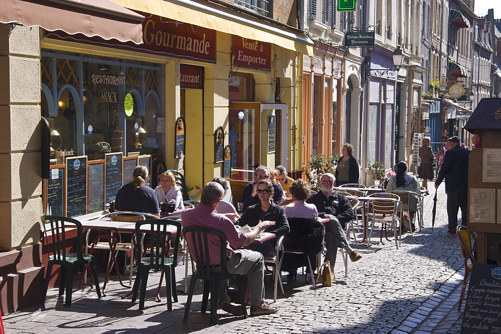 Terrace tables outside the many cafes and restaurants on Rue de Lille in the old quarter of Boulogne, Pas-de-Calais, France, Europe