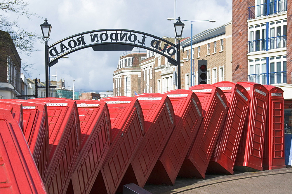 Red telephone box sculpture entitled Out of Order by David Mach, Kingston upon Thames, Surrey, England, United Kingdom, Europe