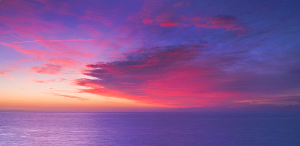 A spectacular sunset over the English Channel near Old Harry Rocks, Dorset, England, United Kingdom, Europe