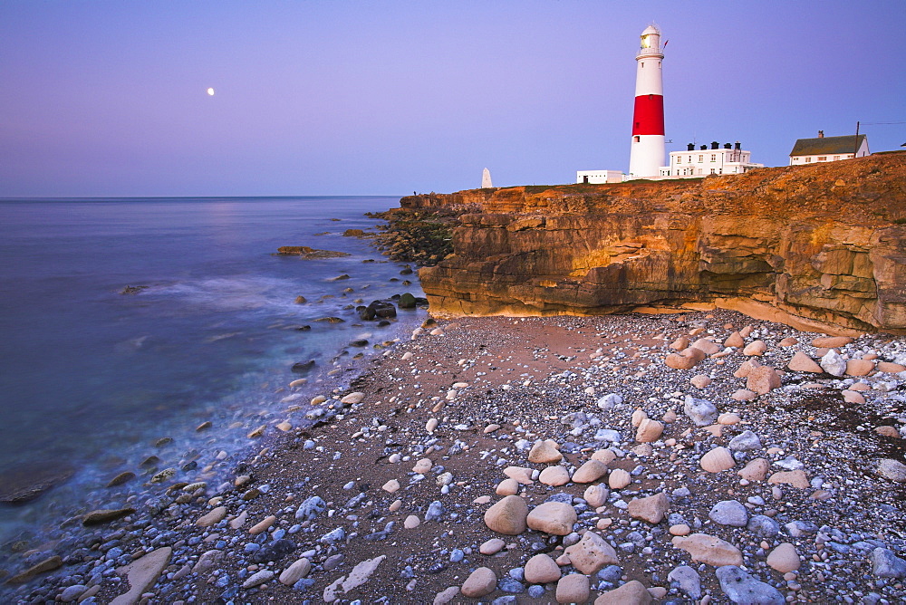 The moon glows over the sea at Portland Bill, Jurassic Coast, UNESCO World Heritage Site, Dorset, England, United Kingdom, Europe