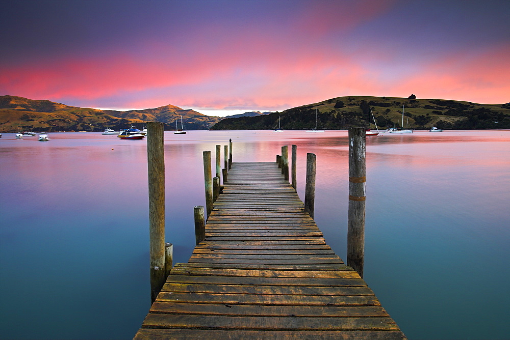 Sunrise over Akaroa harbour, Canterbury, South Island, New Zealand, Pacific