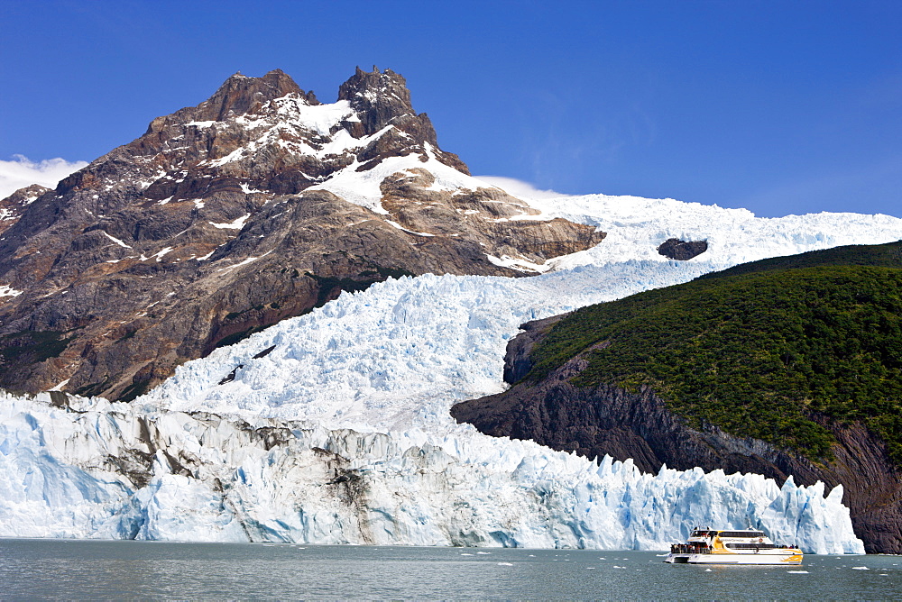 Upsala Glacier and tourist boat in Los Glaciares National Park, UNESCO World Heritage Site, Patagonia, Argentina, South America