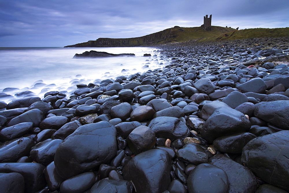 Stormy morning on the coast beside Dunstanburgh Castle, Dunstanburgh, Northumberland, England, United Kingdom, Europe