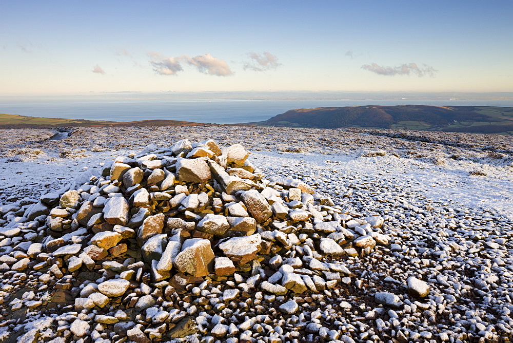 Stone Cairn at Dunkery Beacon on a snowy winters morning, Exmoor National Park, Somerset, England, United Kingdom, Europe