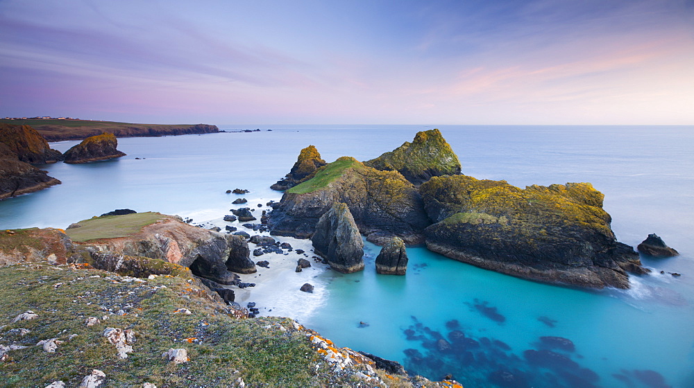 Twilight over Kynance Cove on the Lizard Peninsula, Cornwall, England, United Kingdom, Europe