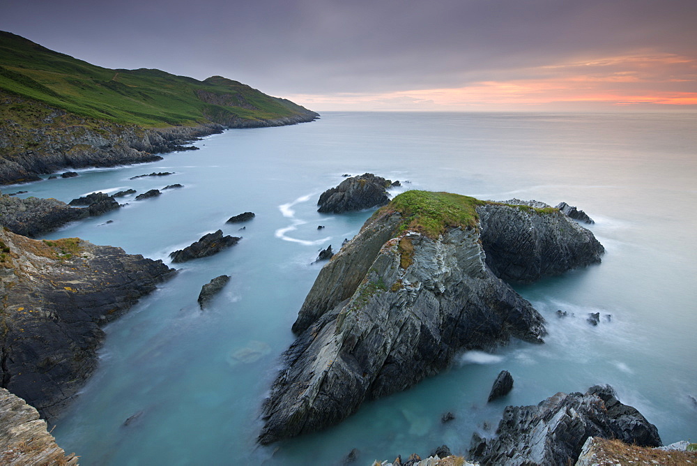 Sunset over Oreweed Cove on the Morte Point peninsula, North Devon, England, United Kingdom, Europe