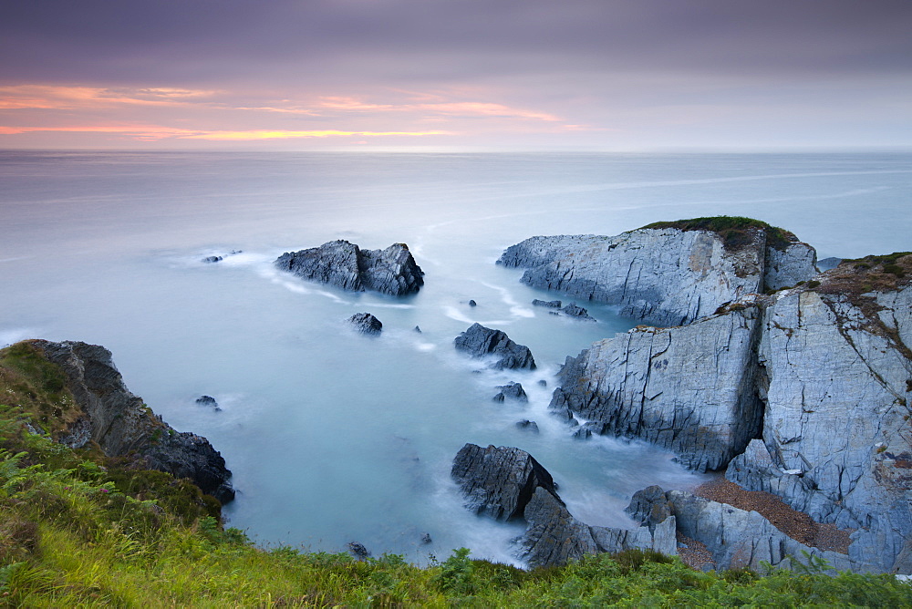 Sunset over Oreweed Cove on the Morte Point peninsula, North Devon, England, United Kingdom, Europe