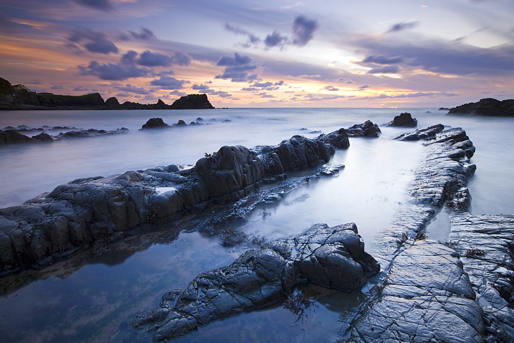 Hartland Quay at dusk from the rocky Quay Beach, North Devon, England, United Kingdom, Europe